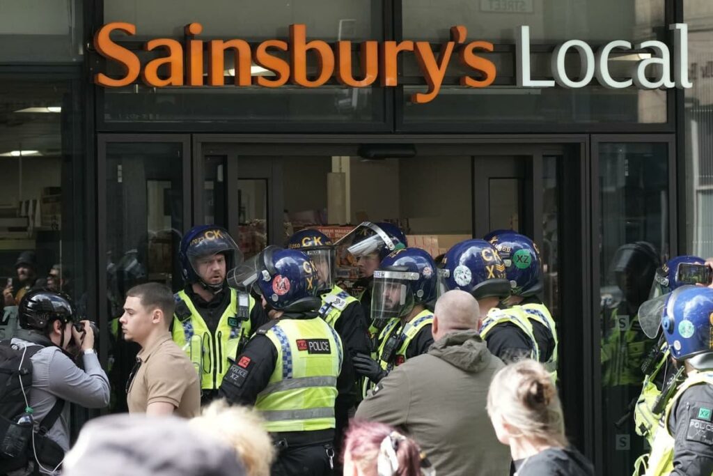 Looters targeted retail shops across the UK amid widespread riots last night, taking advantage of the chaos to ransack stores.